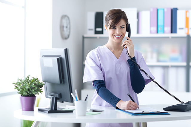 Receptionist speaking on phone